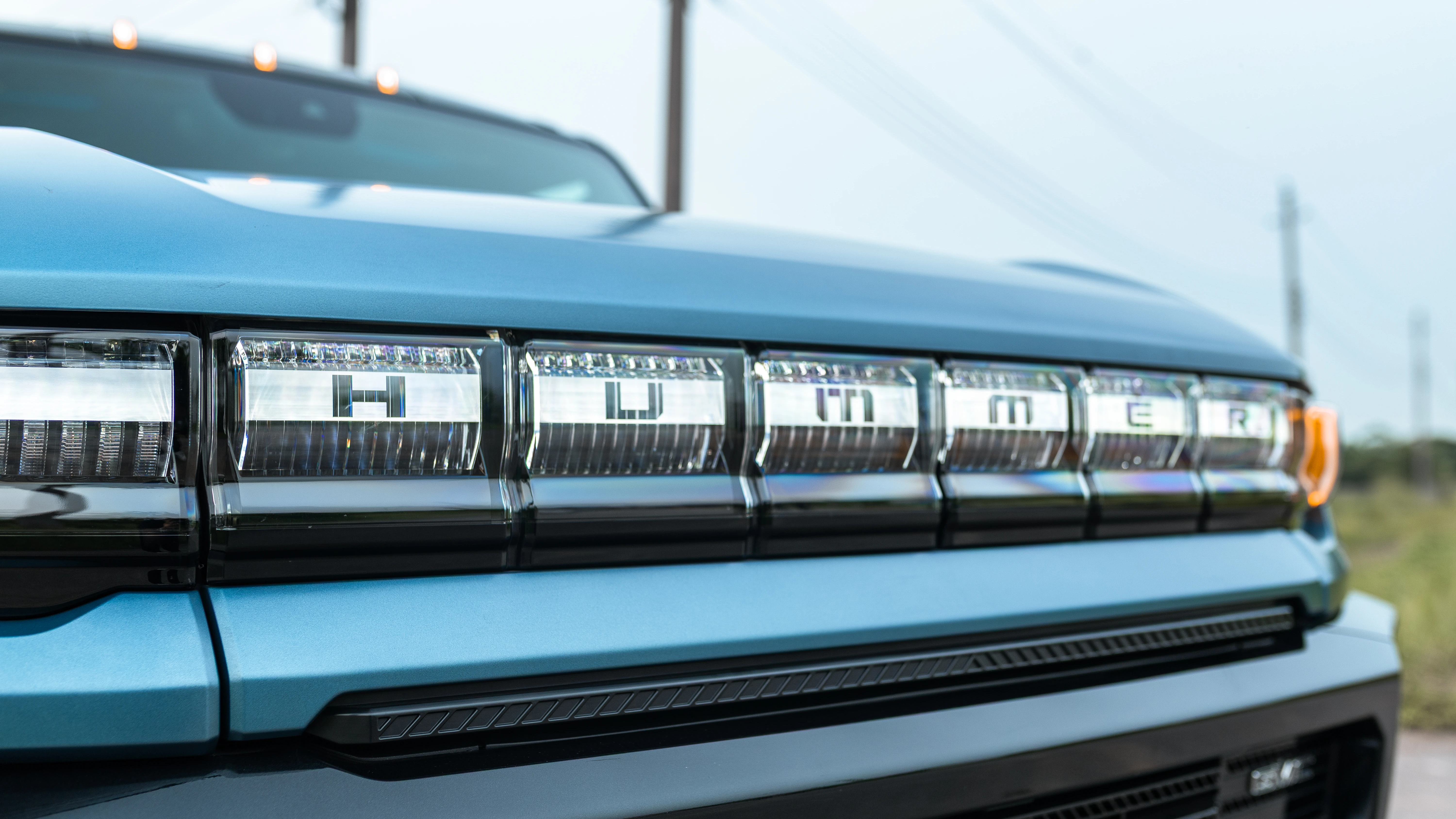 HUMMER lettering inside the full-width LED lightbar grille