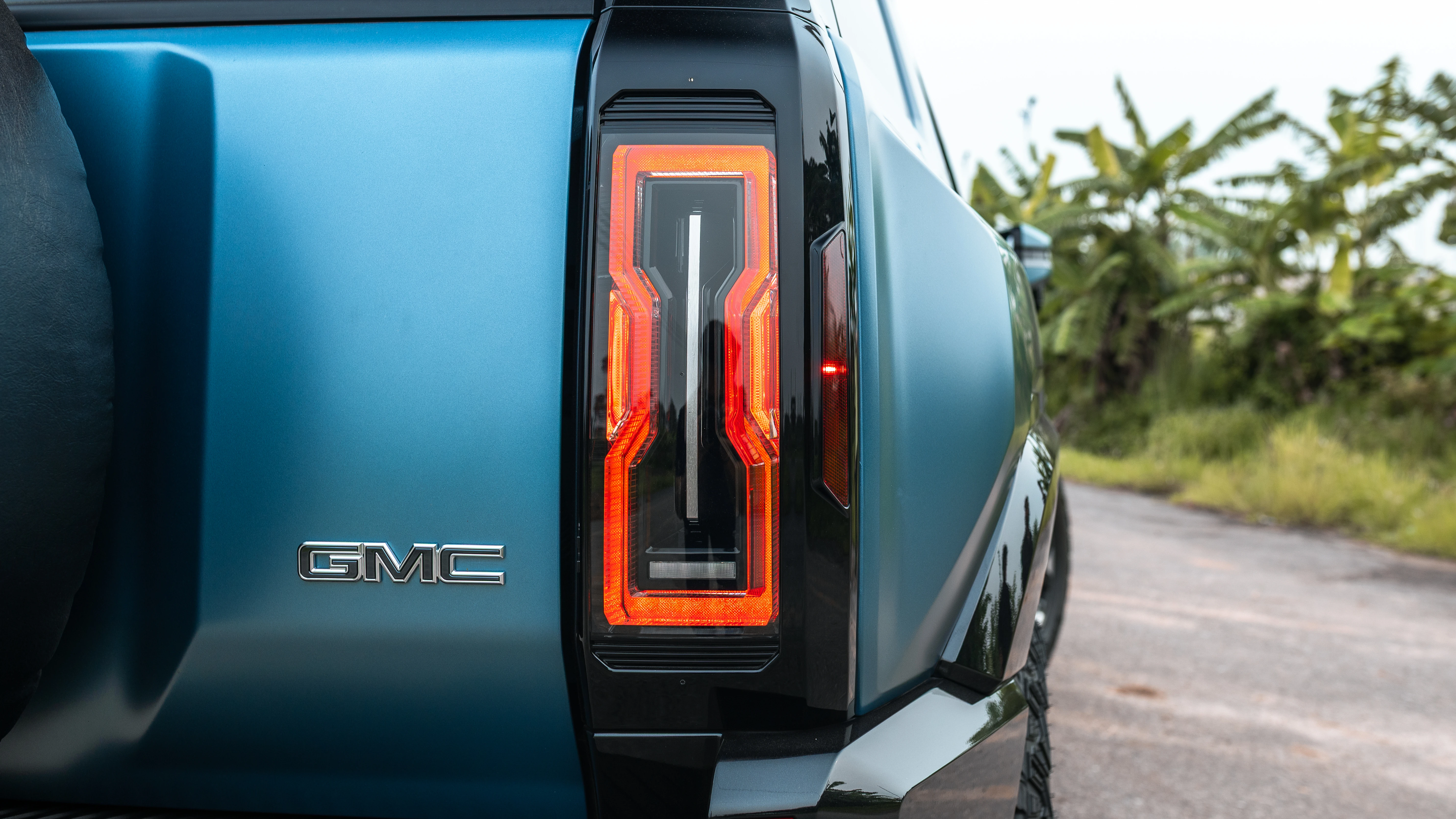 Vertical LED taillight detail beside the GMC badge