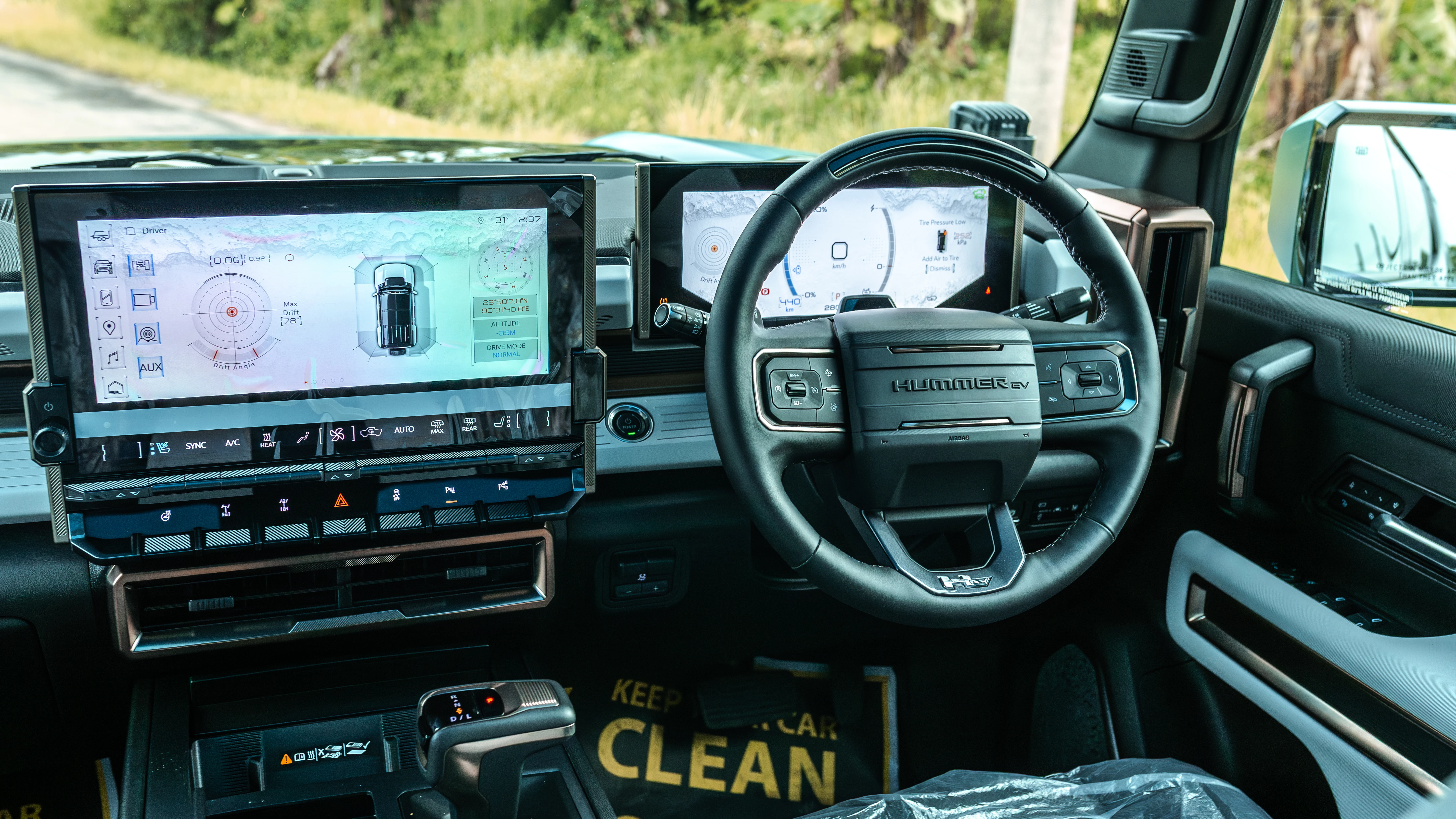 Full right-hand-drive cockpit with 13.4-inch infotainment and 12.3-inch cluster