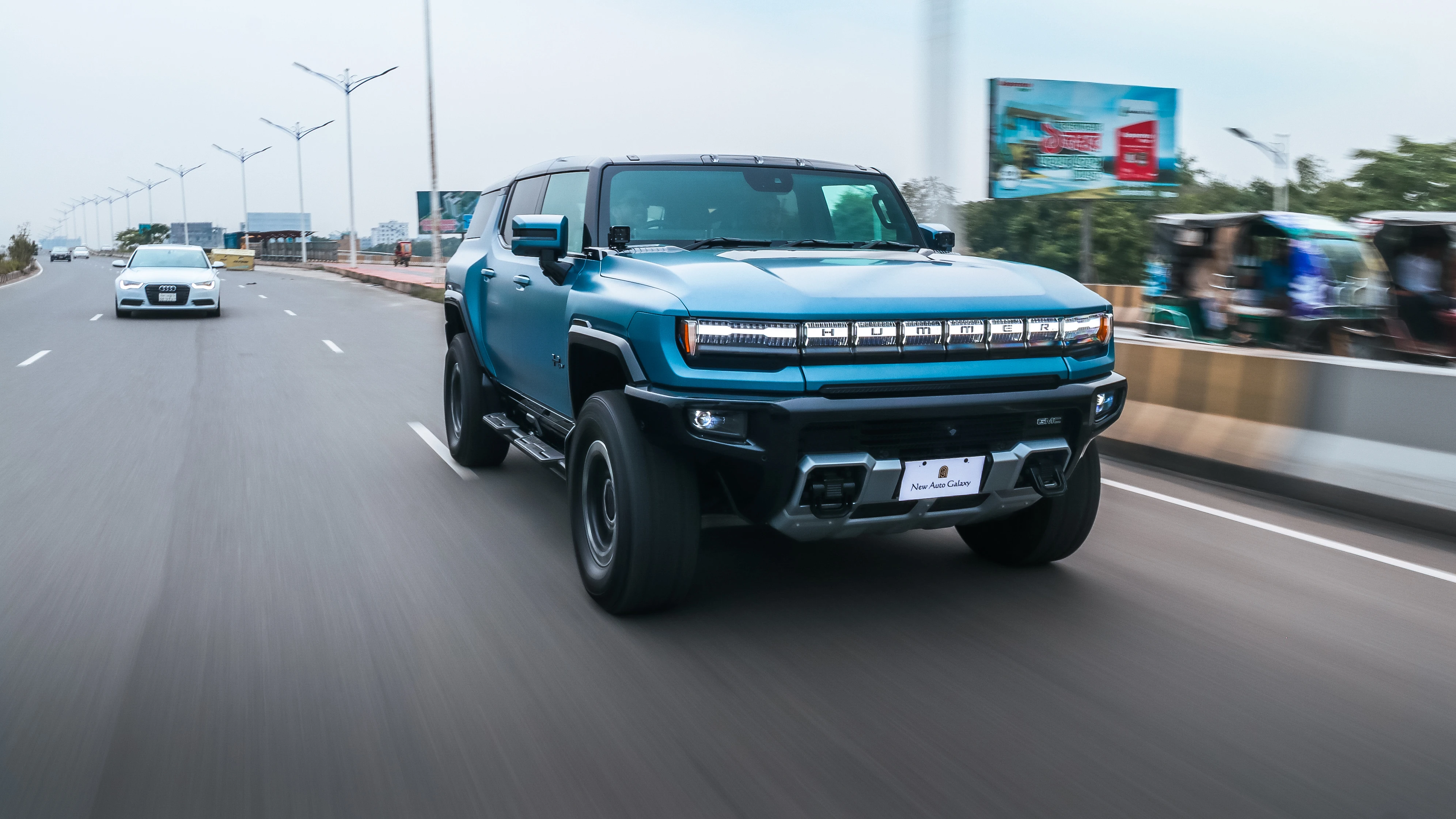 GMC Hummer EV SUV 3X Omega Edition rolling on the Dhaka elevated expressway
