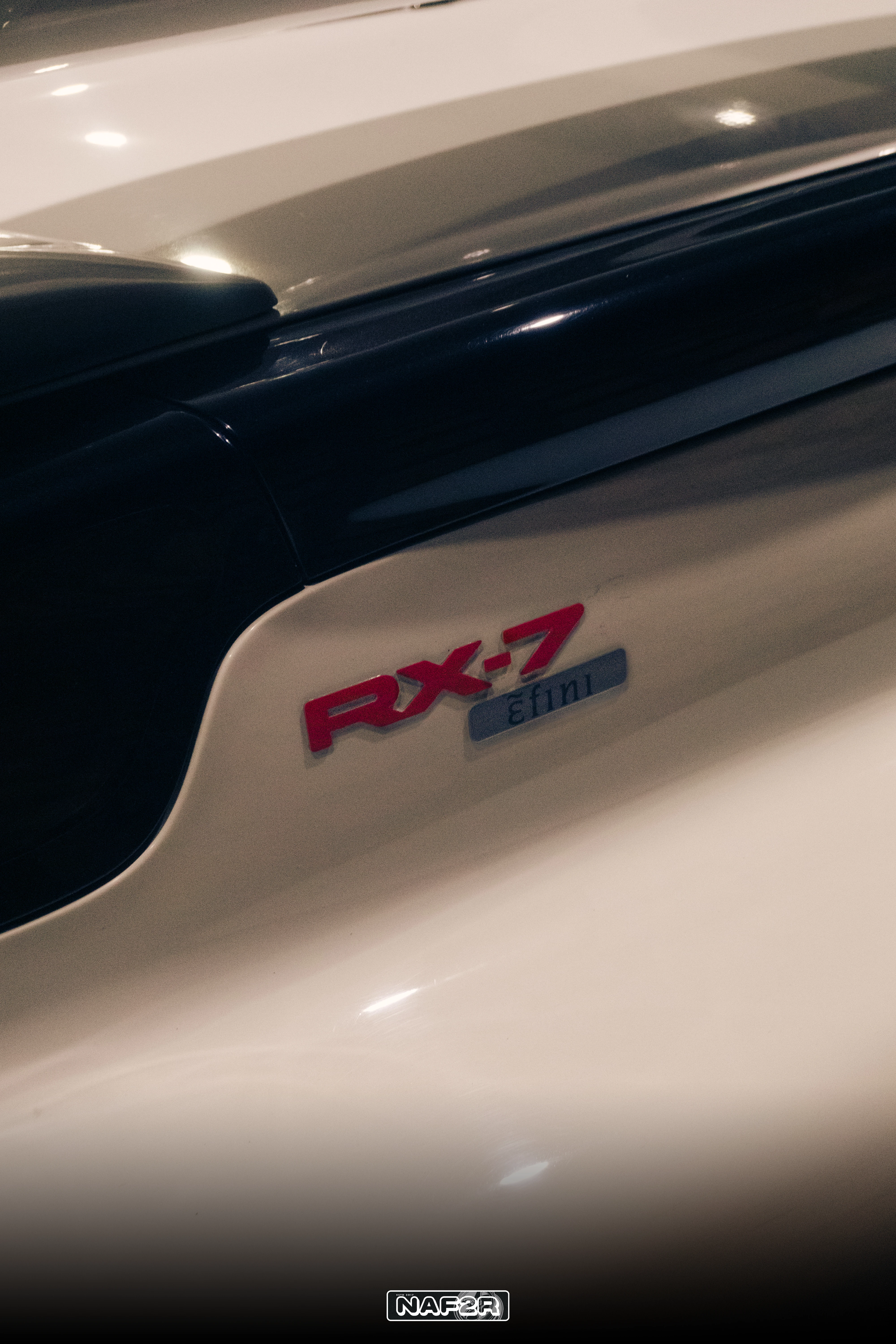RX-7 efini badge