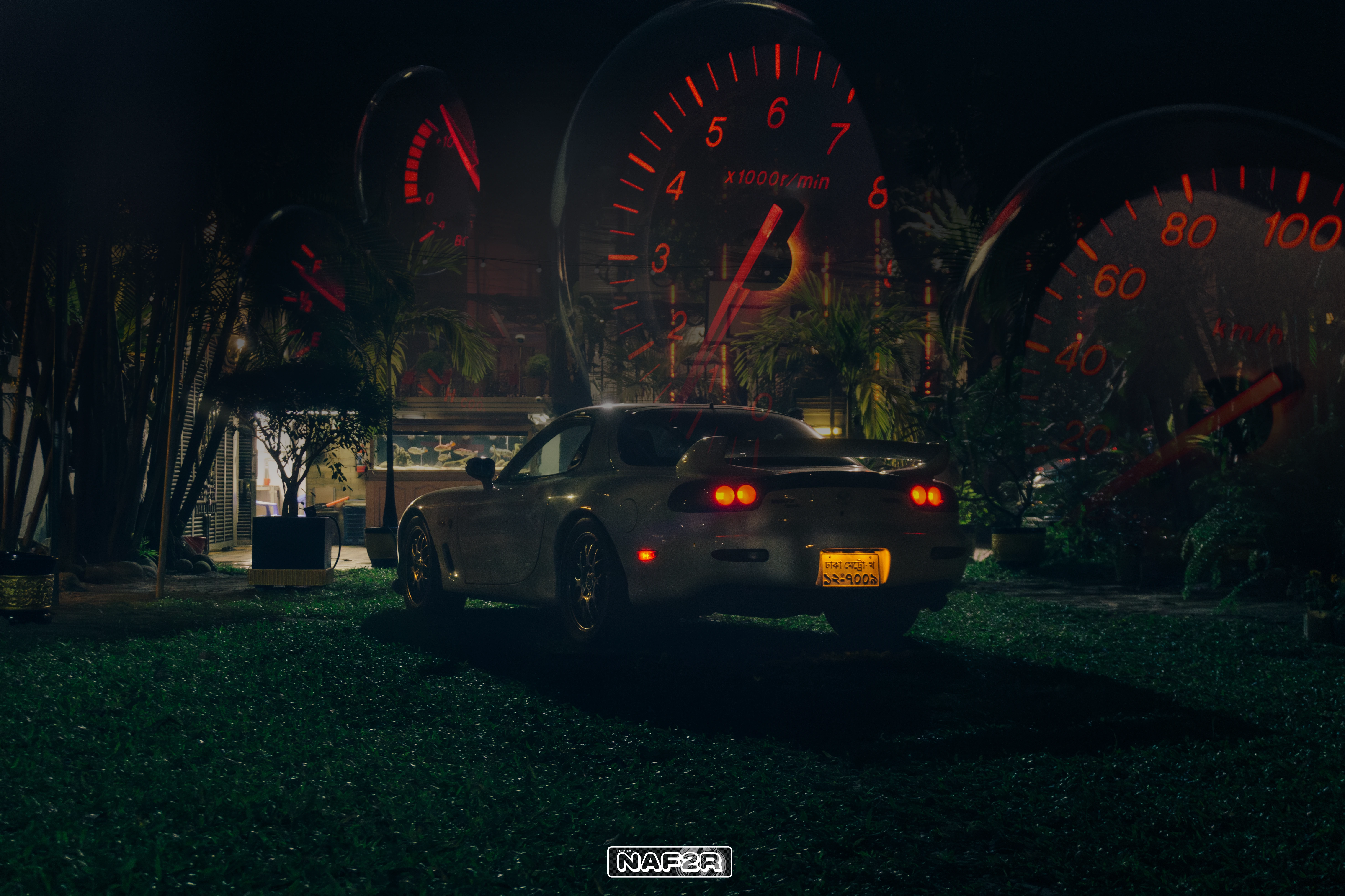 RX-7 rear with rotary gauge cluster double exposure